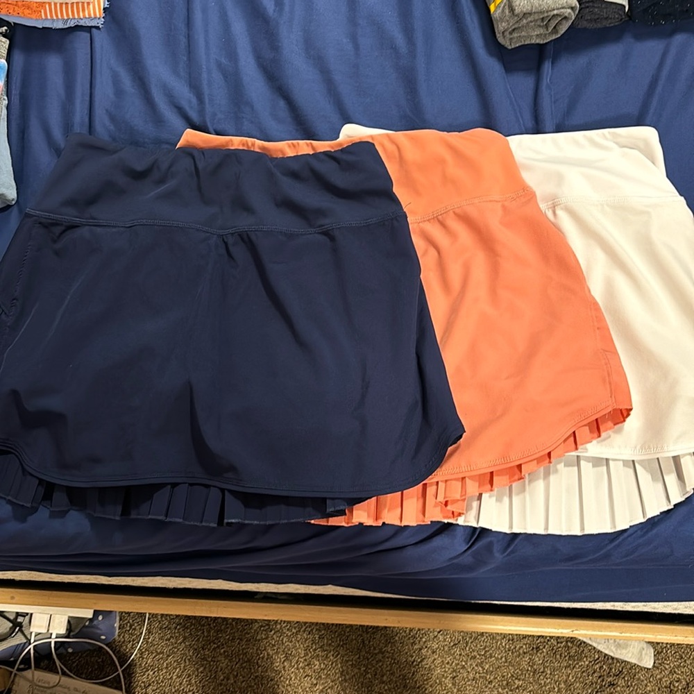 3 pack Amazon golf skirts.